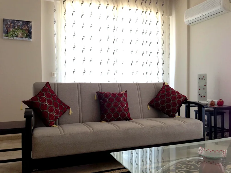 Living room sofa inside the Calis Sunstay holiday apartment